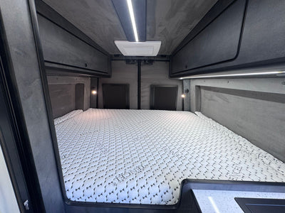 a bed inside a vehicle