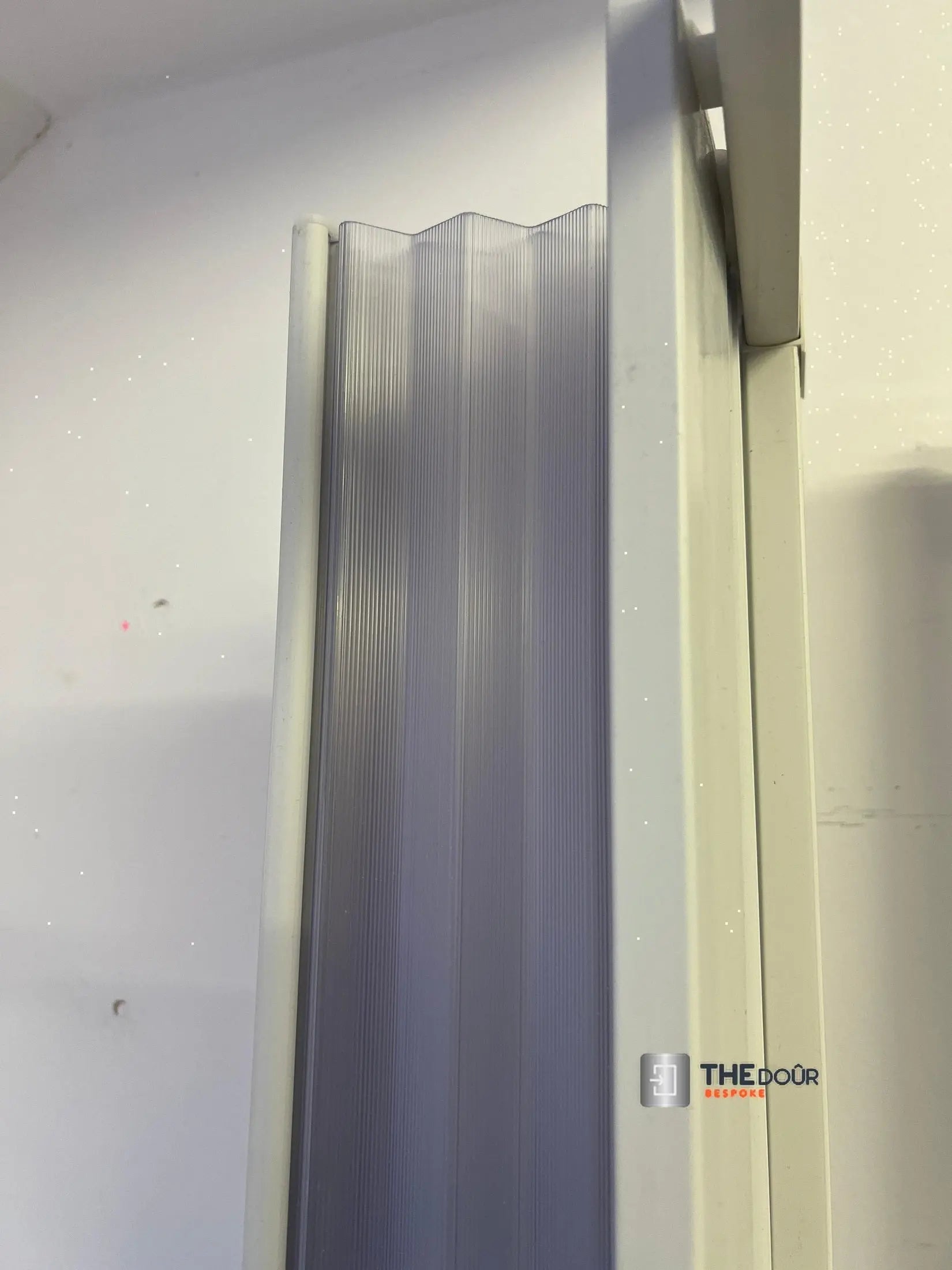 FLEXdoûr Corner PVC Shower Door with central Opening 1850mm Height x Various Reducible Width THEdoûr Bespoke