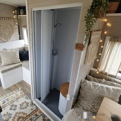 White FOLdoûr Bi Fold Accordion Aluminium Frame Frosted White Acrylic Shower Screen Door Designed for a Campervan FOLdoûr