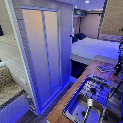 White FOLdoûr Bi Fold Accordion Aluminium Frame Frosted White Acrylic Shower Screen Door Designed for a Campervan FOLdoûr